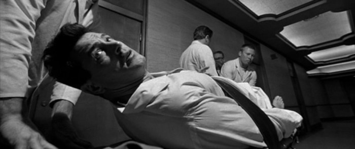 Rock Hudson strapped to a hospital cart in Seconds (1966)